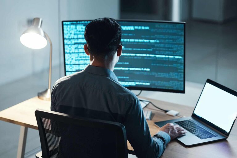 office-programming-and-man-with-technology-code-2025-04-06-12-36-07-utc (1)
